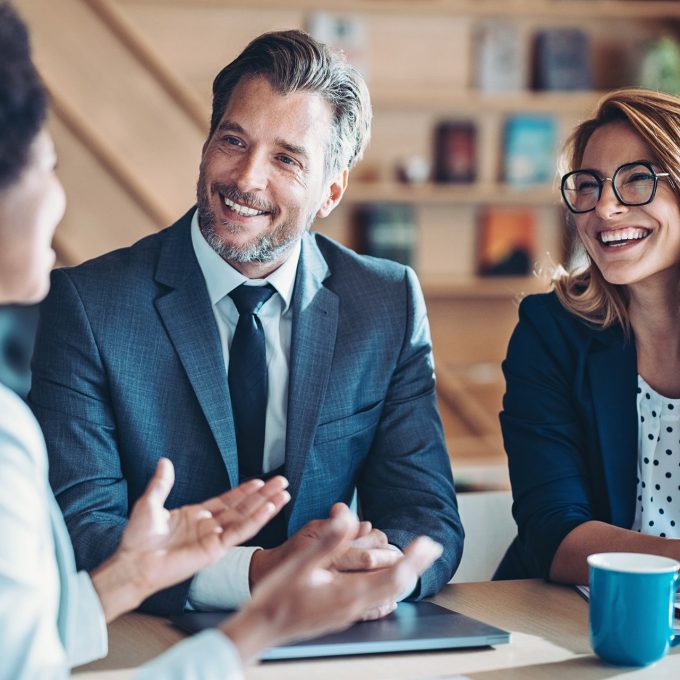 Business persons talking in the office